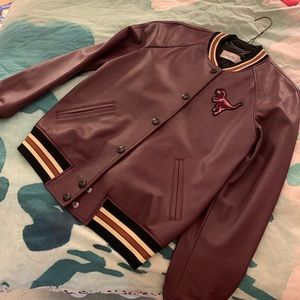 Coach leather varsity jacket. 99% new. Softest leather and so cute on.